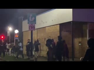 Kenosha residents gathered in front of grocery store to protect it