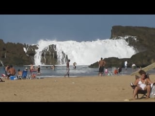 Massive wave at playa puerto nuevo in vega baja, puerto rico