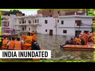 Floods ravage india, thousands porn to evacuate