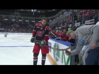 Linus omark tries to score with a burning stick at khl asg16