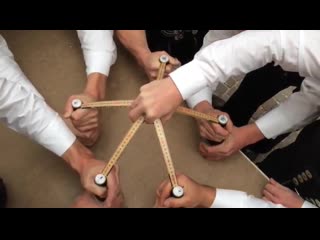 These guys opened 5 bottles of beer at once only using rulers!