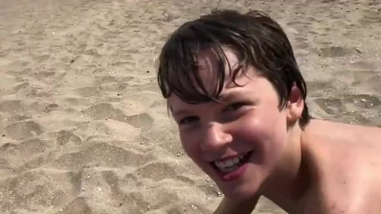 Gabriel bateman on the beach