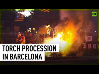 Demonstrators light up flares and torches on catalan independence referendum anniversary