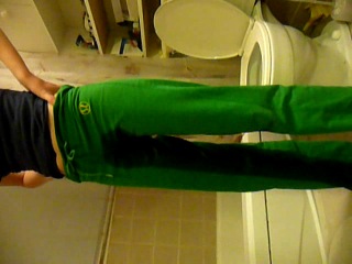 Green sweatpants pee