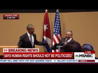 Raul castro raises president obamas limp arm