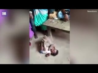 Screaming monkey snatches a baby