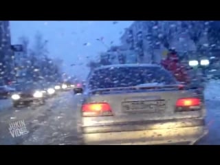 Good samaritan helps old woman cross the street