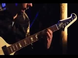 Tim skold behind the player dvd playing "putting holes in happiness"