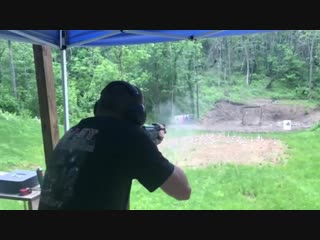 Ak 47 muzzle blast deflecting rain