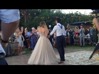 Bride puts a spell on her magician groom during first dance