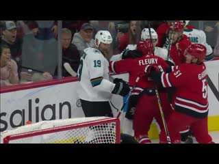 Joe thornton snaps and punches goalie petr mrazek in the face, scrum ensues