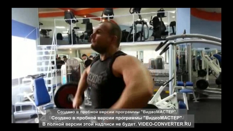 Тяга к подбородку широким хватом