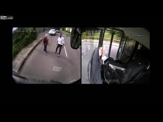 Bus driver in hungary leaps out of bus to stop mugging of elderly woman