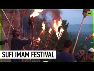 Kashmiri muslims celebrate sufi imam with torch light festival