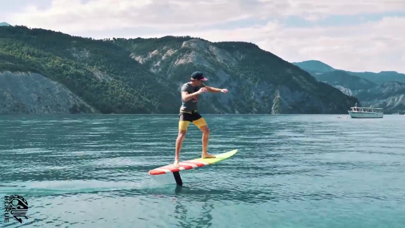 Foil surfing on flat water hydrofoil pumping