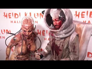 Heidi klum goes for gory as she hosts starry halloween bash