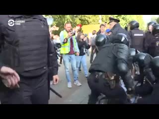 Russian police brutally club peaceful protesters on the ground in todays moscow demonstrat