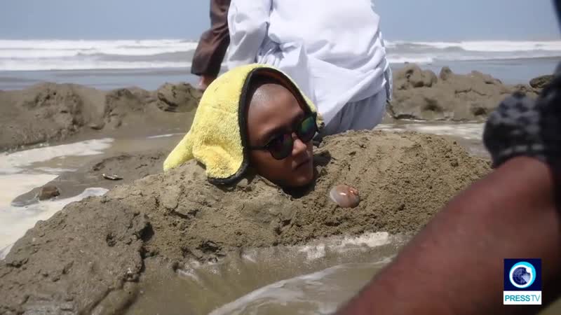 Pakistan disabled people buried in sand in superstitious ritual copied from page