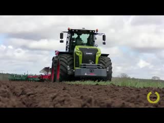 Claas xerion 5000 mit 12 schar wendepflug pw 100 variomat von kverneland beim pflügen 2017 mp4