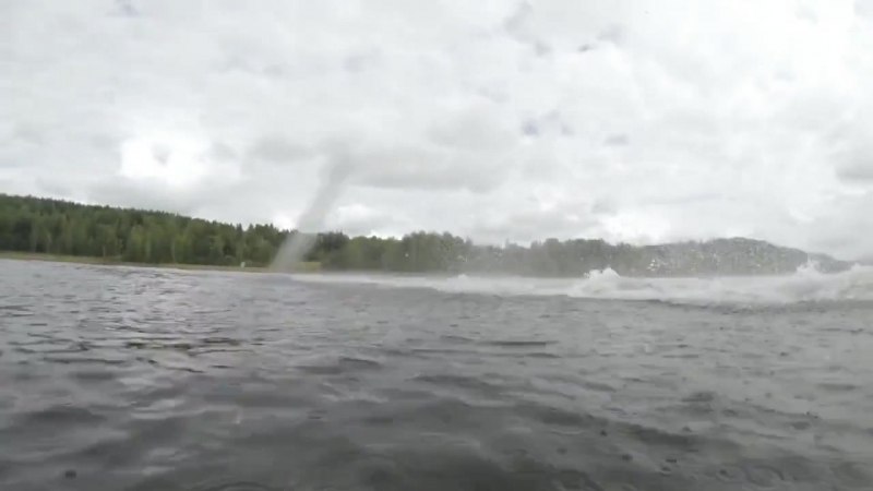 Snowmobile wheelies on water