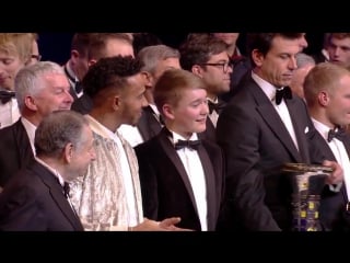 Top three receive their trophies