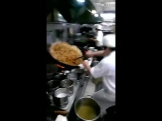 A chinese chef stir fry with a really hardcore approach