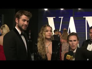 Miley cyrus basically had to roll around in tape to make her wardrobe safe for tv tonight oscars