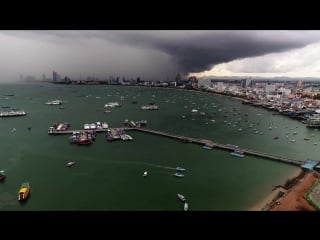 Hyperlapse of a big storm brewing across pattaya bay from the pattaya sign part 1