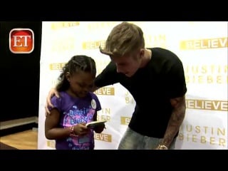 Bieber grants 8 year old's wish, breaks record