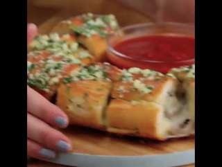 Meatball stuffed garlic bread