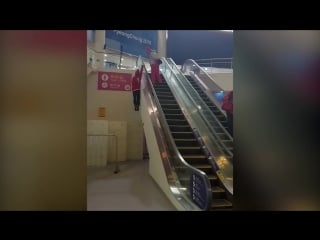 Watch winter olympics skiers unusual way of using an escalator