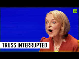 Liz truss’ conservative party conference speech interrupted by greenpeace activists