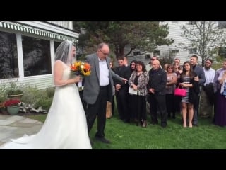 Dad surprises daughter by walking her down the aisle at her wedding
