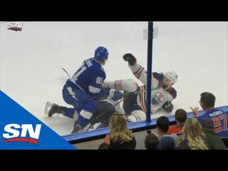 Zack kassian kicks erik cernak in chest after hit and pile up