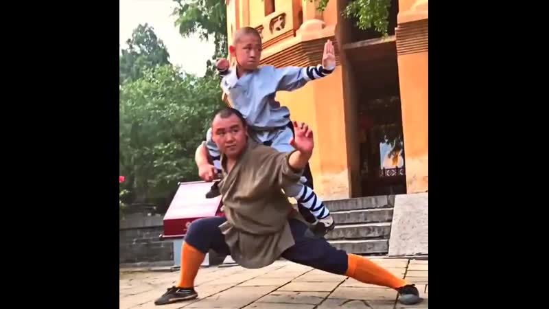 Shaolin master yan luo with his little disciple