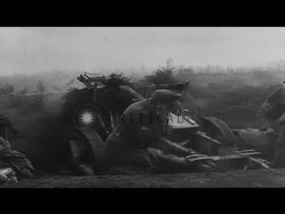 German forces,attempting to hold the line, fire artillery at at advancing stock footage