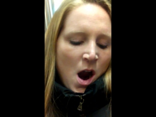 Candid blonde woman yawning