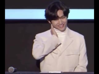 Taehyung putting his best fakest smile, he’s so annoyed with the q