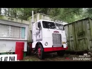 1962 white freightliner cabover with vintage trailmobile recovery