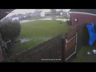 Home security camera video of a tornado today in the western part of mobile, alabama
