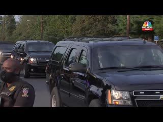 President trump's motorcade drives past supporters outside of walter reed medical center