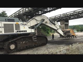 Transporting by side the huge liebherr 984 heavy machines