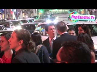 Miles teller amp jai courtney depart divergent premiere at regency bruin theatre westwood