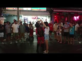 Illusionist trick with a girl and cigarette (bangla road, phuket)