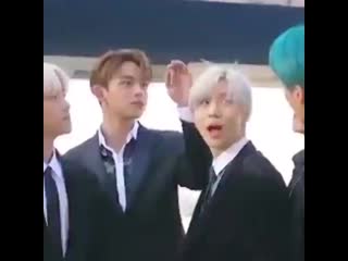 Taemin was using his "antennas" to call shinee again but lucas said nope not today