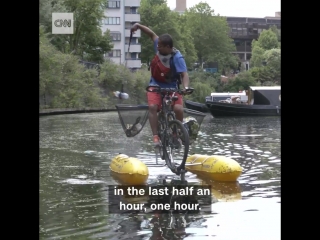 This man built a floating bicycle so he could clean trash from a river in order to raise awareness about plastic pollution!