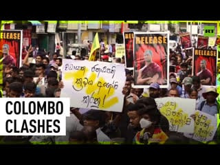 Tear gas & water cannons cops clash with protesters in sri lanka