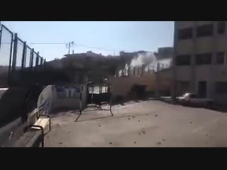 Israeli occupation forces fire teargas at a school in the village of taqou in the occupied west bank, today