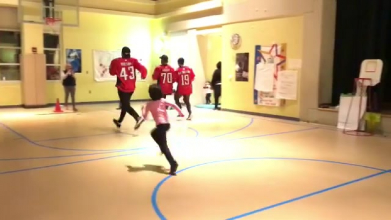 Braden holtby, nicklas backstrom, and tom wilson show elementary schoolers how to properly exercise