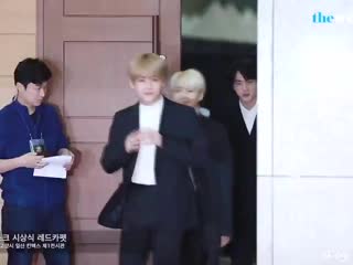 When taehyung was trying to listen through the door but when the doors opened acted like n